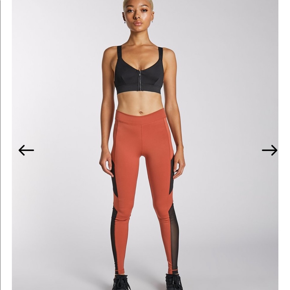 Rust colored leggings , SECNDTURE brand.